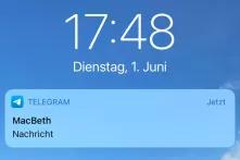 Ausschnitt eines Smartphone-Startbildschirms mit einer Telegramnachricht von "MacBeth"