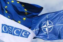 NATO, EU und OSCE Flagge