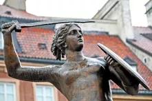 Mermaid with sword and shield in Warsaw