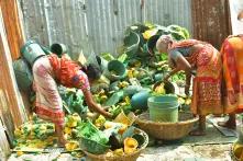 three women sorting plastic waste